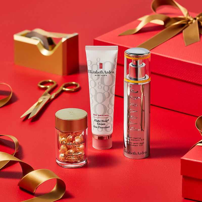 Elizabeth Arden skincare products on a red background with gold accents