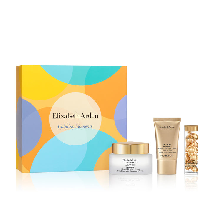 Elizabeth Arden Uplifting Moments 3-Piece Gift Set packaging with contents displayed in front, including Advanced Ceramide Capsules Daily Youth Restoring Serum, Advanced Ceramide Lift and Firm Day Cream SPF 15, and Advanced Ceramide Lift and Firm Night Cream.