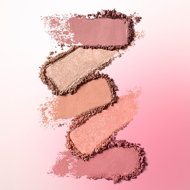 Blush swatches on top of a pink ombre background