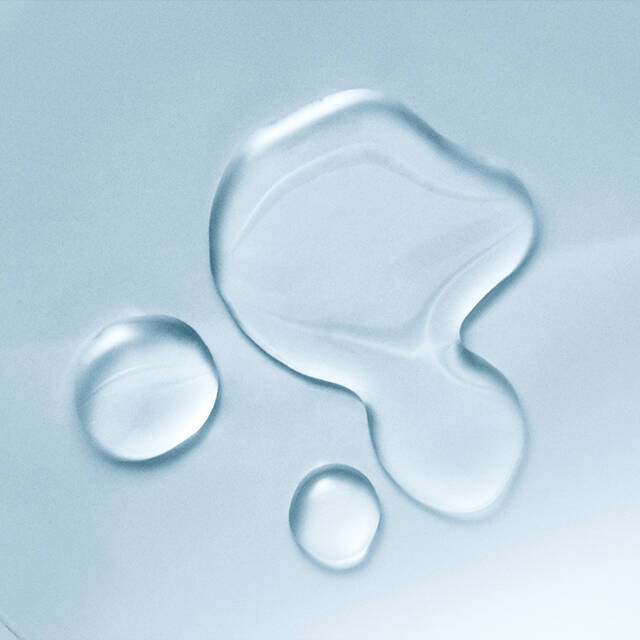 Phytoceramides- Close-up of water droplets on a light blue surface