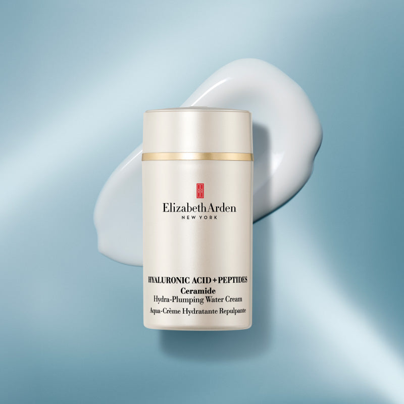 The new HA Water Cream with it's creamy texture shot behind in on a light blue background.